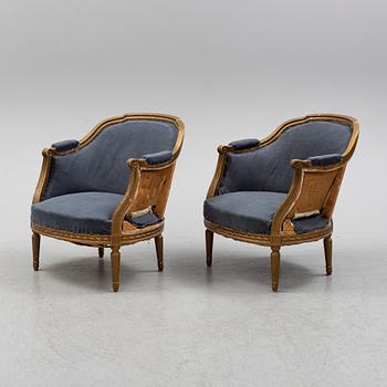 A pair of armchairs, Louis XVI-style, first half of the 20th century.