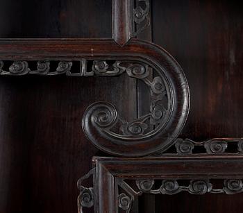 A Chinese hardwood cabinet, early 20th Century.