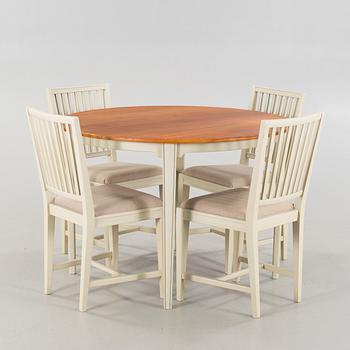 Four chairs and a dining table, probably Karl Andersson & Söner, second half of the 20th century.
