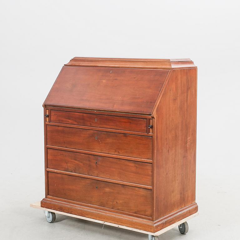 A mahogany flap secretaire first half of the 20th century.