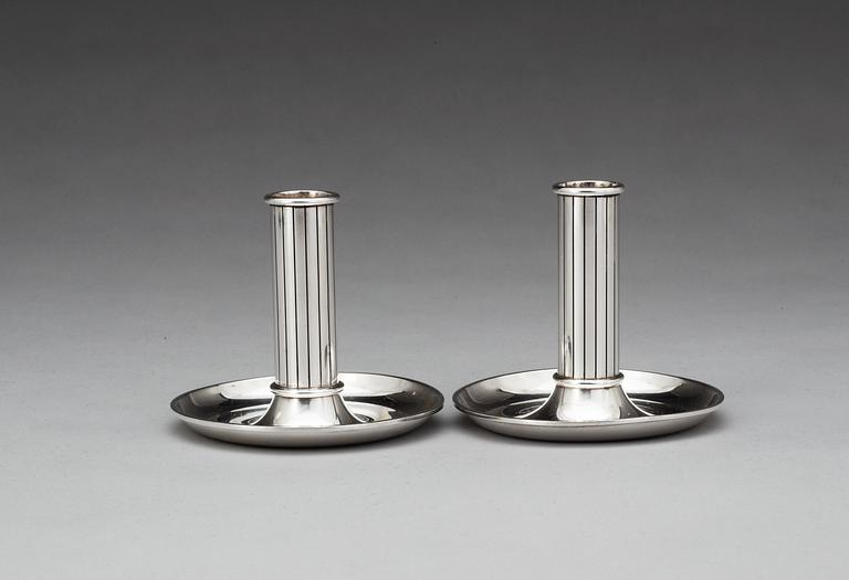 A pair of Sigvard Bernadotte sterling candlesticks, design nr 948 by Georg Jensen, Copenhagen post 1945-77.