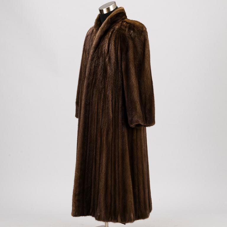 A Long Brown Mink Coat by Grosvenor to Harrods.