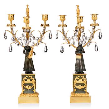 A pair of French  circa 1820-30th´s Empire candelabra.