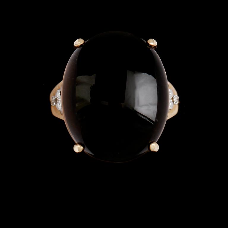 RING, 10 k guld, rökkvarts, diamanter tot ca 0.02 ct.