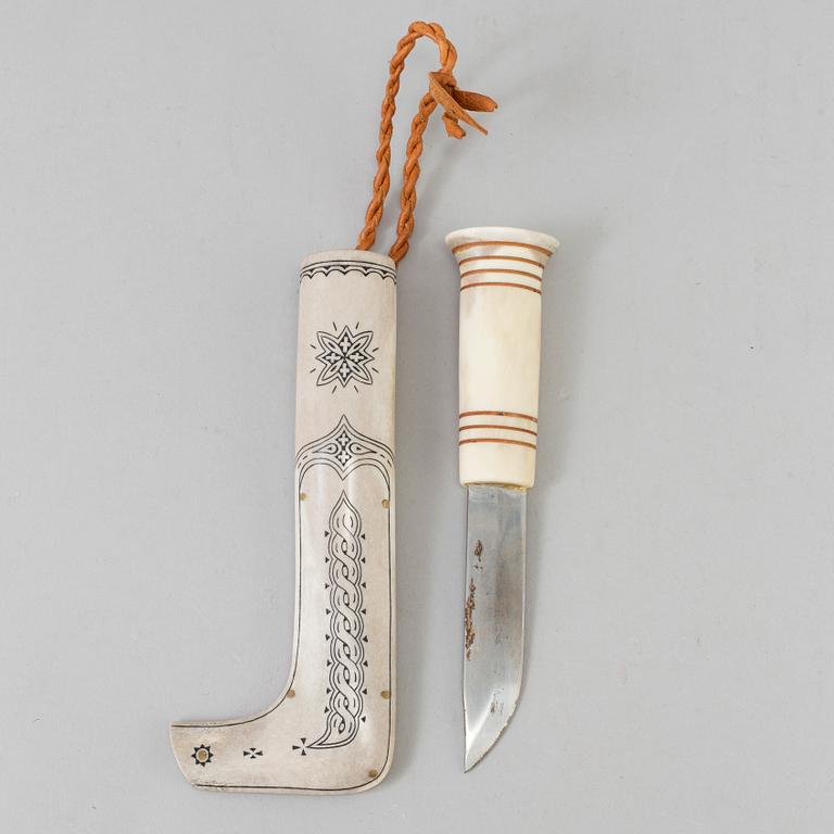 A Sami knife, reindeer horn, signed AS and dated -87.