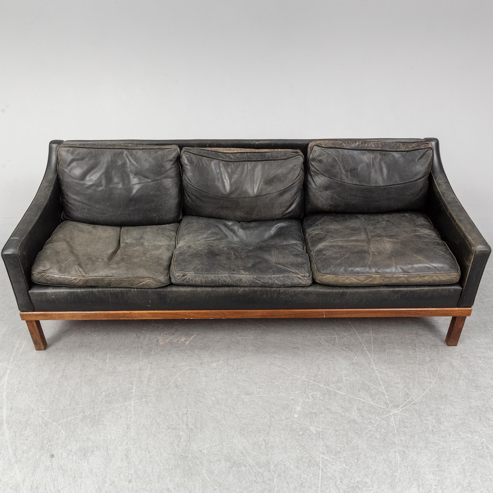 A black leather "The President" sofa by Ingemar Thillmark for OPE-möbler. Sweden.