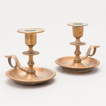 A pair of late 19th century candlesticks.