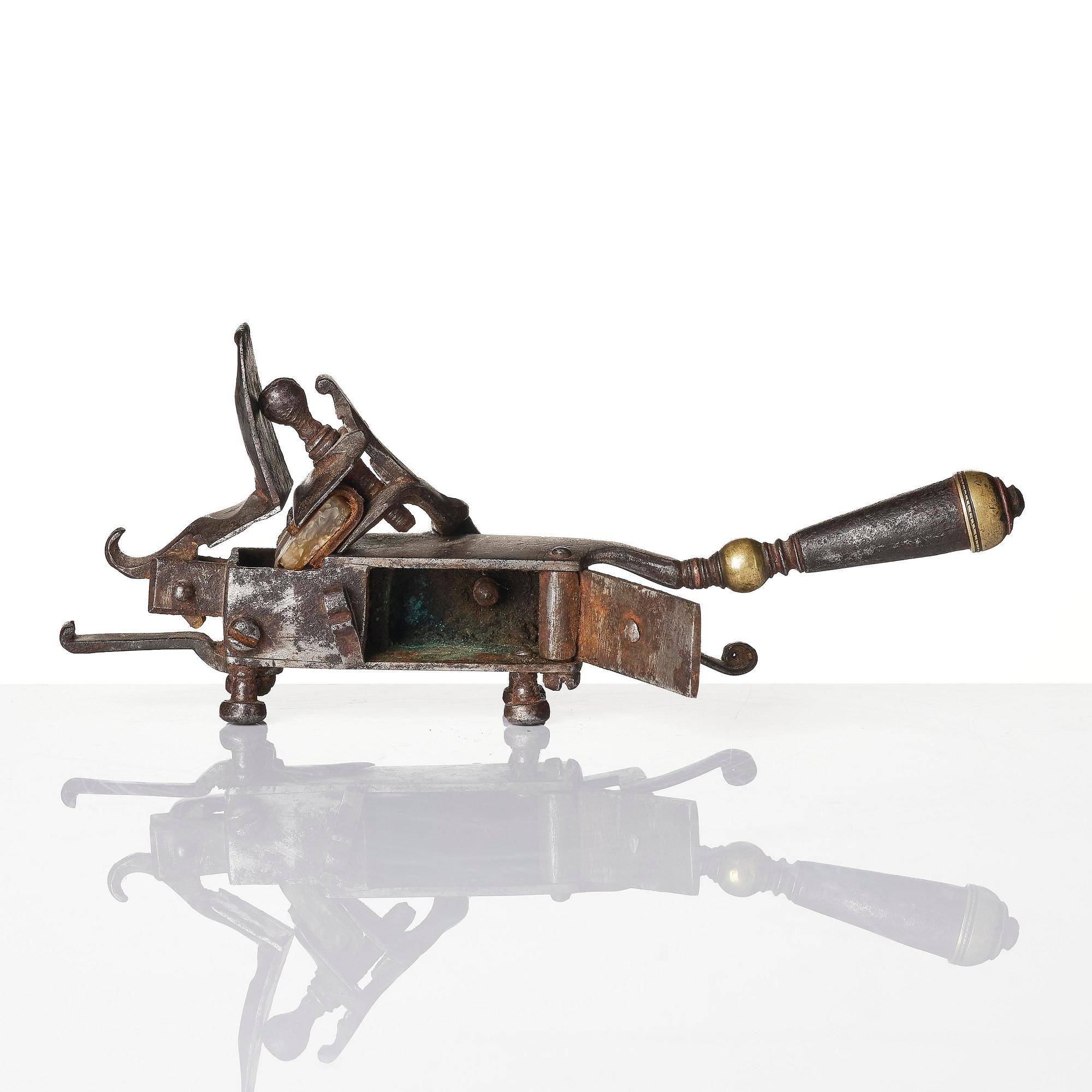 A mechanical flintlock igniter, later part 18th century/early19th century.