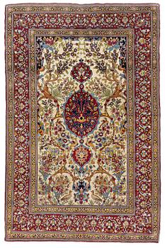 497. An antique Isfahan rug, Central Persia, c. 219 x 143 cm.