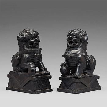 A pair of Chinese buddhist lions in stone, 20th Century.