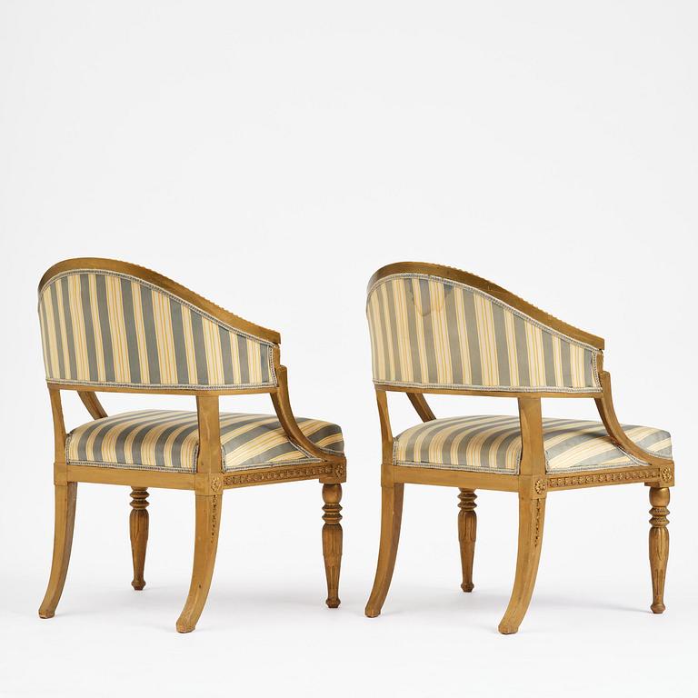 A pair of late Gustavian open armchairs attributed to E. Ståhl (master in Stockholm 1794-1820).