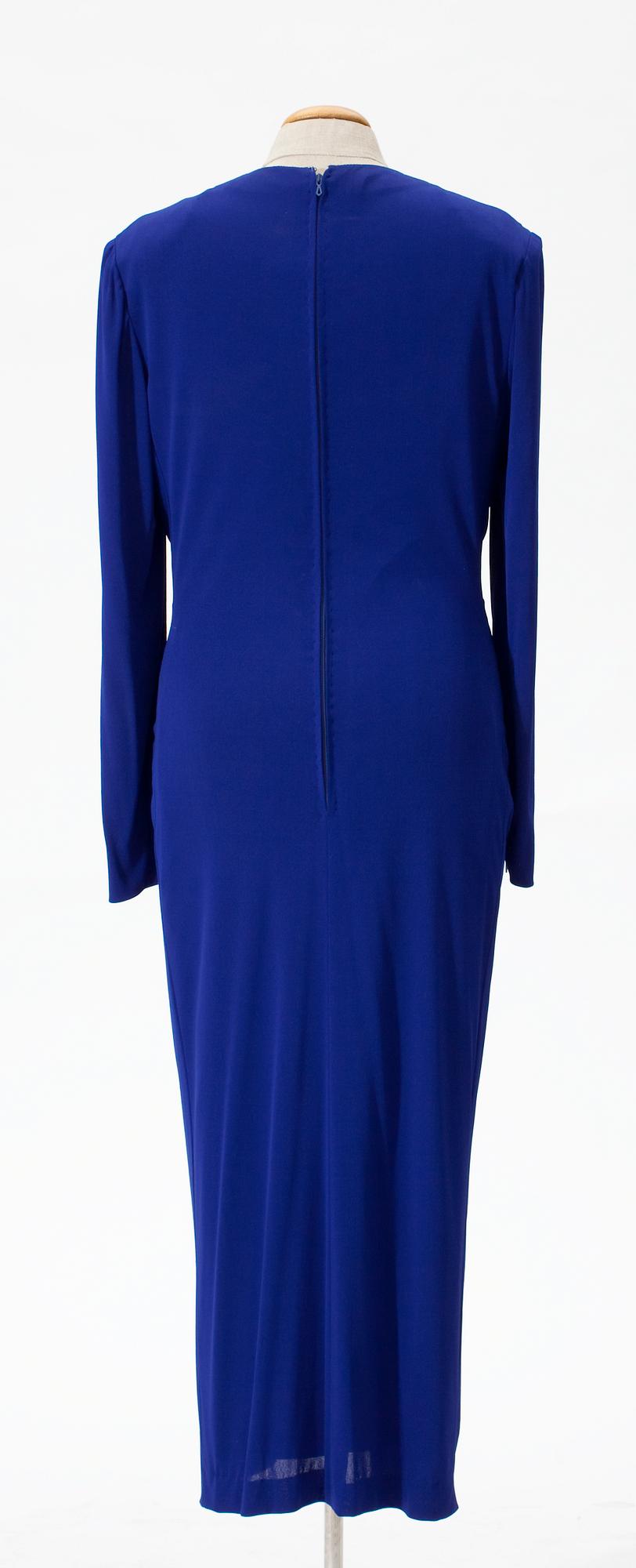 A 1980's cocktail dress with shawl.