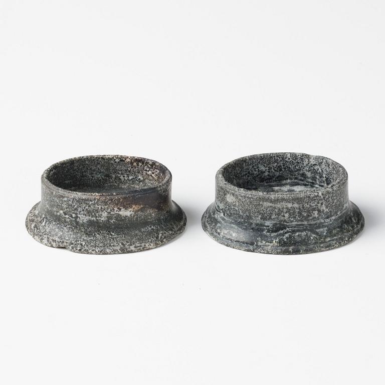 A pair of Swedish Empire 'Kolmård' marble salts, early 19th century.