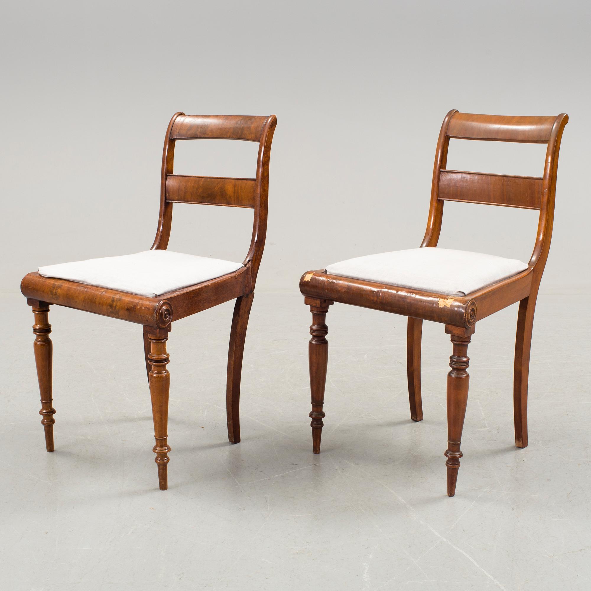 A set of eight Empire mahogany chairs, second quarter of the 19th Century.