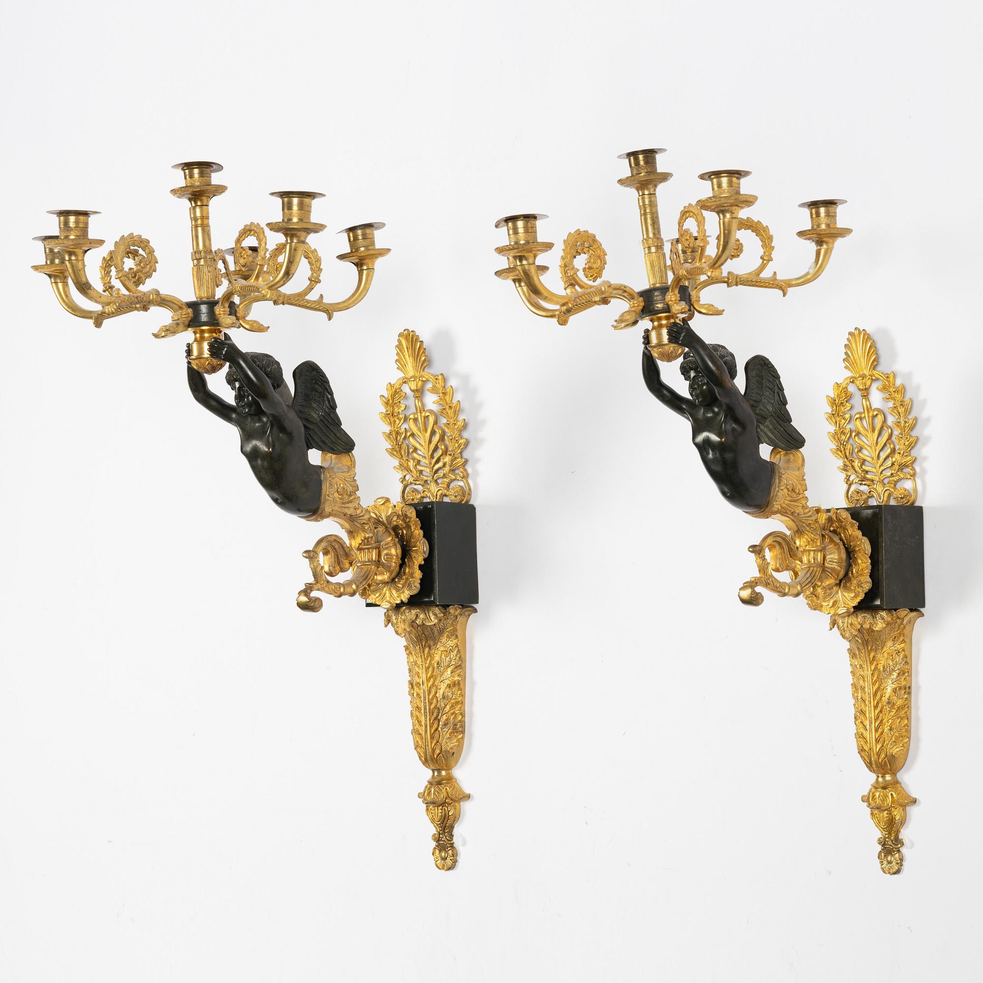 A pair of Empire style appliques, circa 1900.