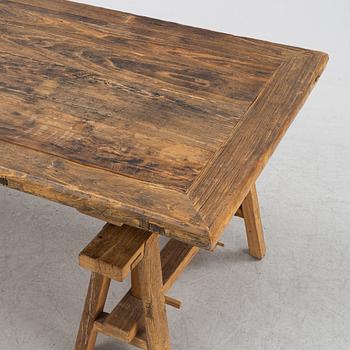 A Walles & Walles dining table.