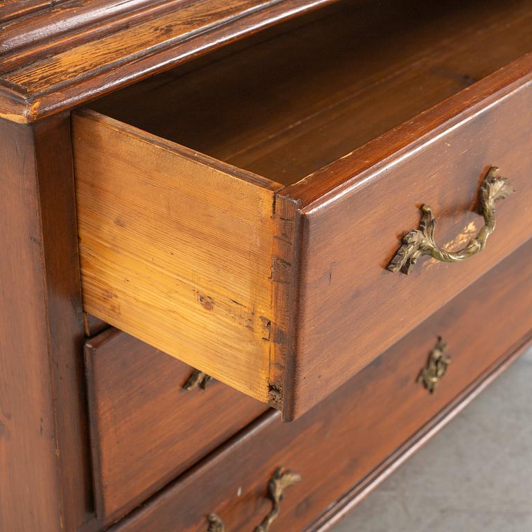 Display cabinet, circa 1900.
