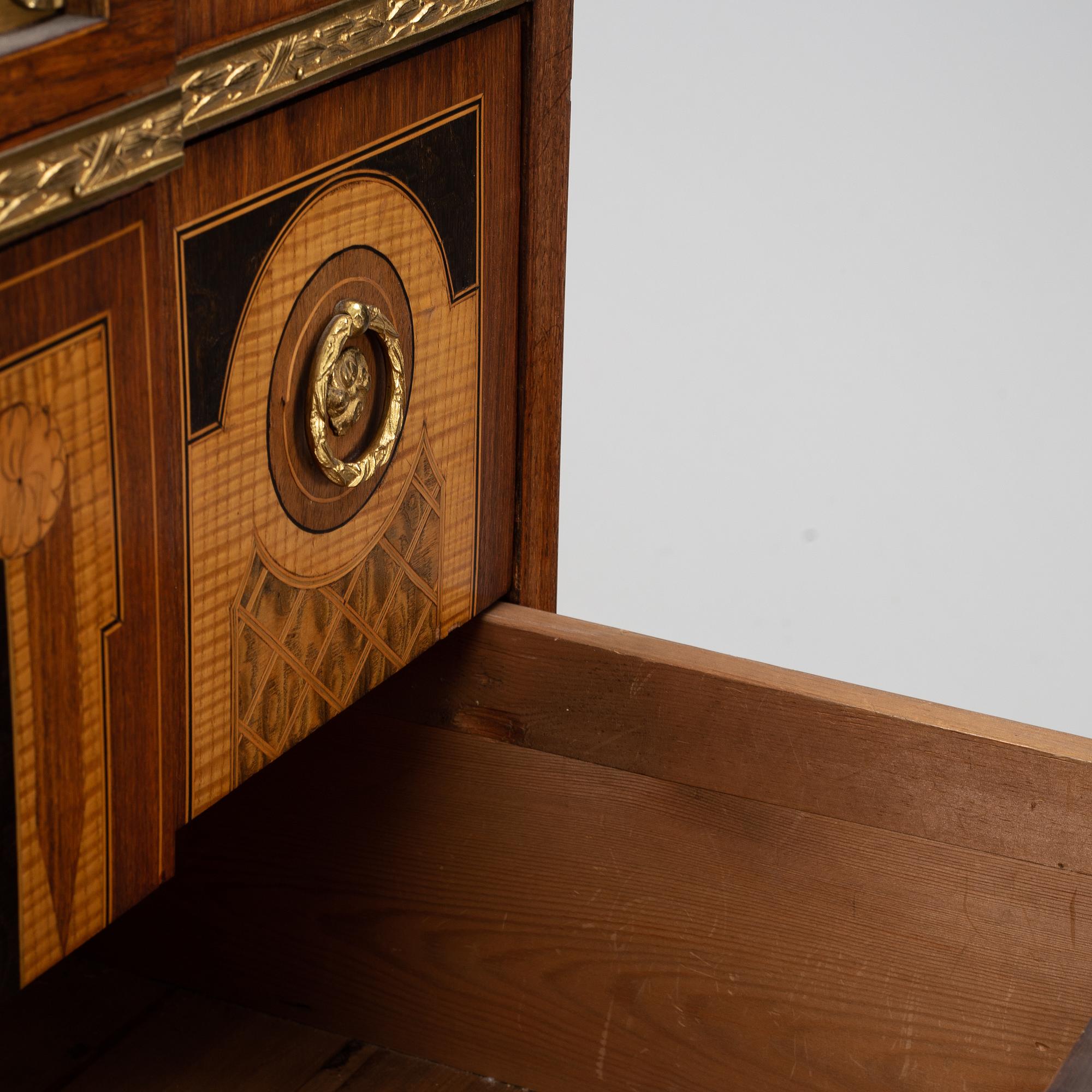 A late Gustavian style chest of drawers, from around the year 1900.