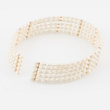 Five-row collar/choker with cultured freshwater pearls and 14K gold beads.