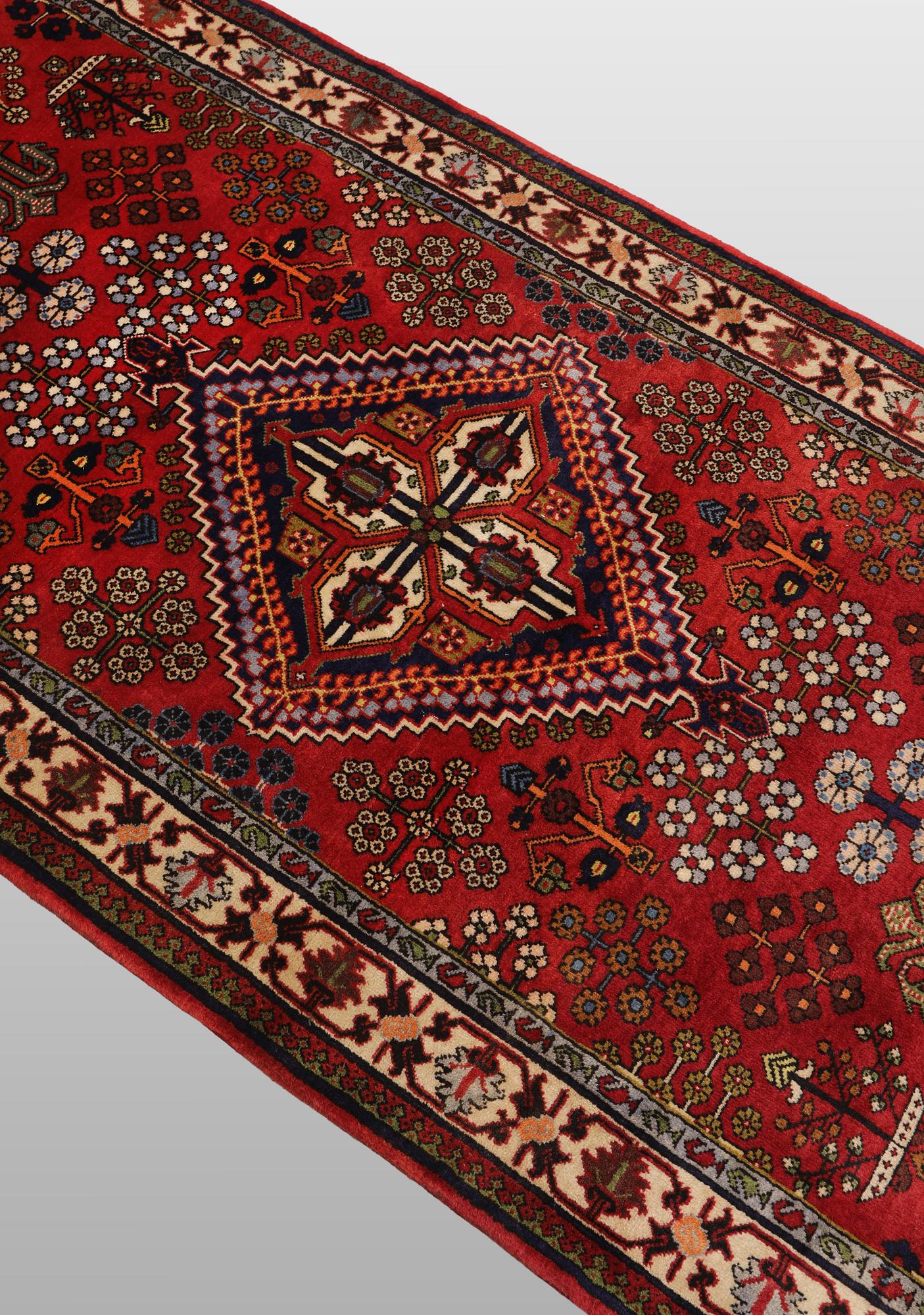 A Josaghan runner carpet, 423 x 100 cm.