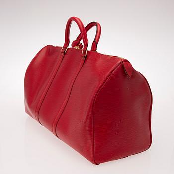 A RED EPI LEATHER KEEPALL 50 TRAVEL BAG.