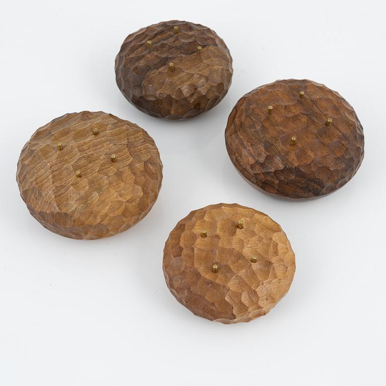 Magnus Ek, a set of four walnut wood canapé holders for Oaxen Krog.
