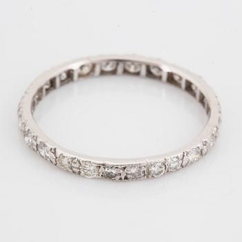 White gold brilliant-cut diamond eternity ring.