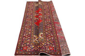 A Persian carpet, ca 326 x 214 cm.