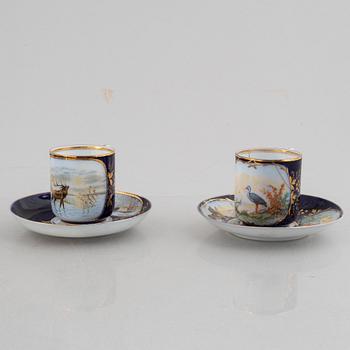 A set of nine porcelain coffee cups with saucers, Kuznetsov, Russia (1891-1917).