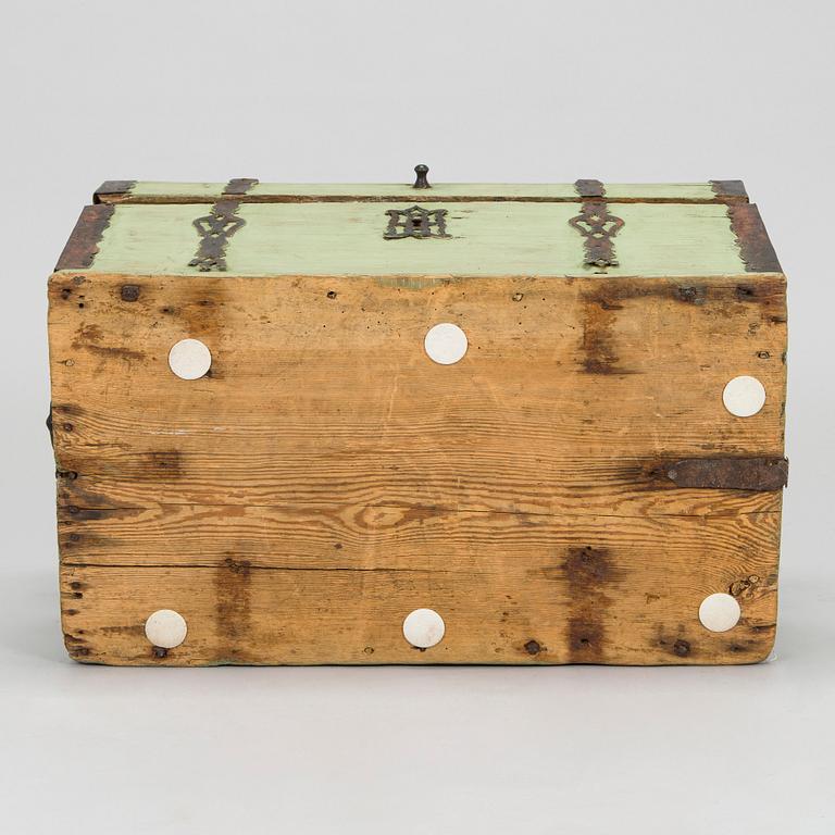 A wooden storage chest dated year 1777.