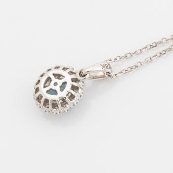 Blue topaz and brilliant cut diamond earrings and necklace.