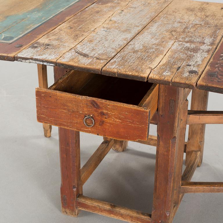 A mid 19th century gateleg table.
