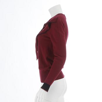 SONIA RYKIEL, a burgundy red wool sweater.