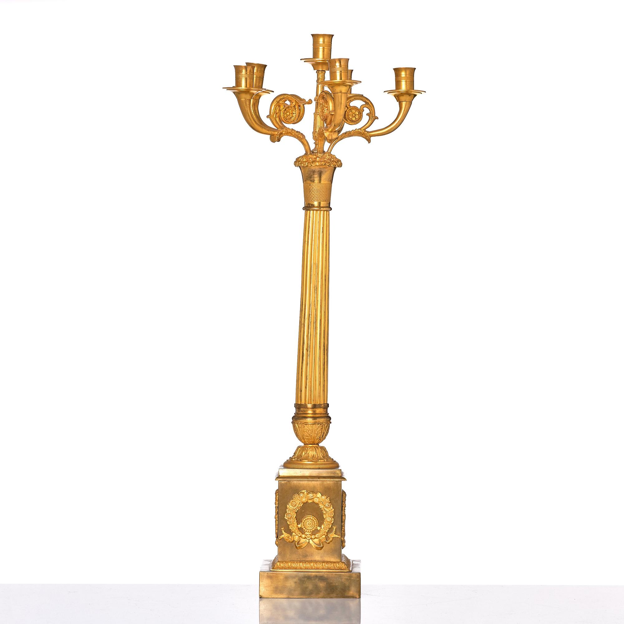 A French late Empire gilded six-light candelabra, mid 19th century.
