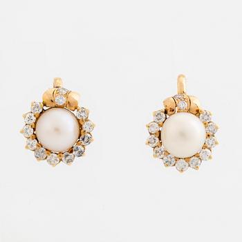 Cultured pearl and brilliant cut diamond earrings.