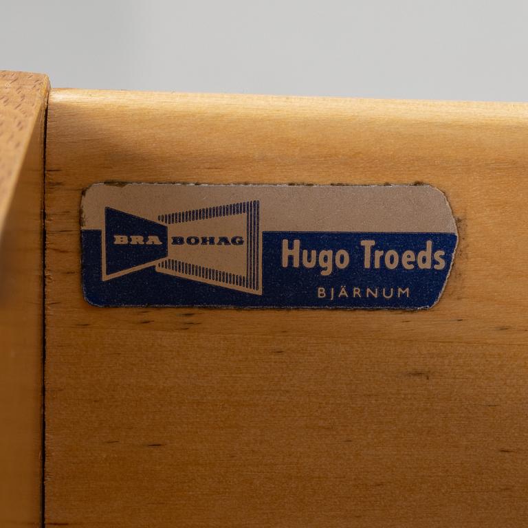 A desk with a drawer unit, Bra Bohag, Hugo Troeds, Bjärnu, mid 20th Century.