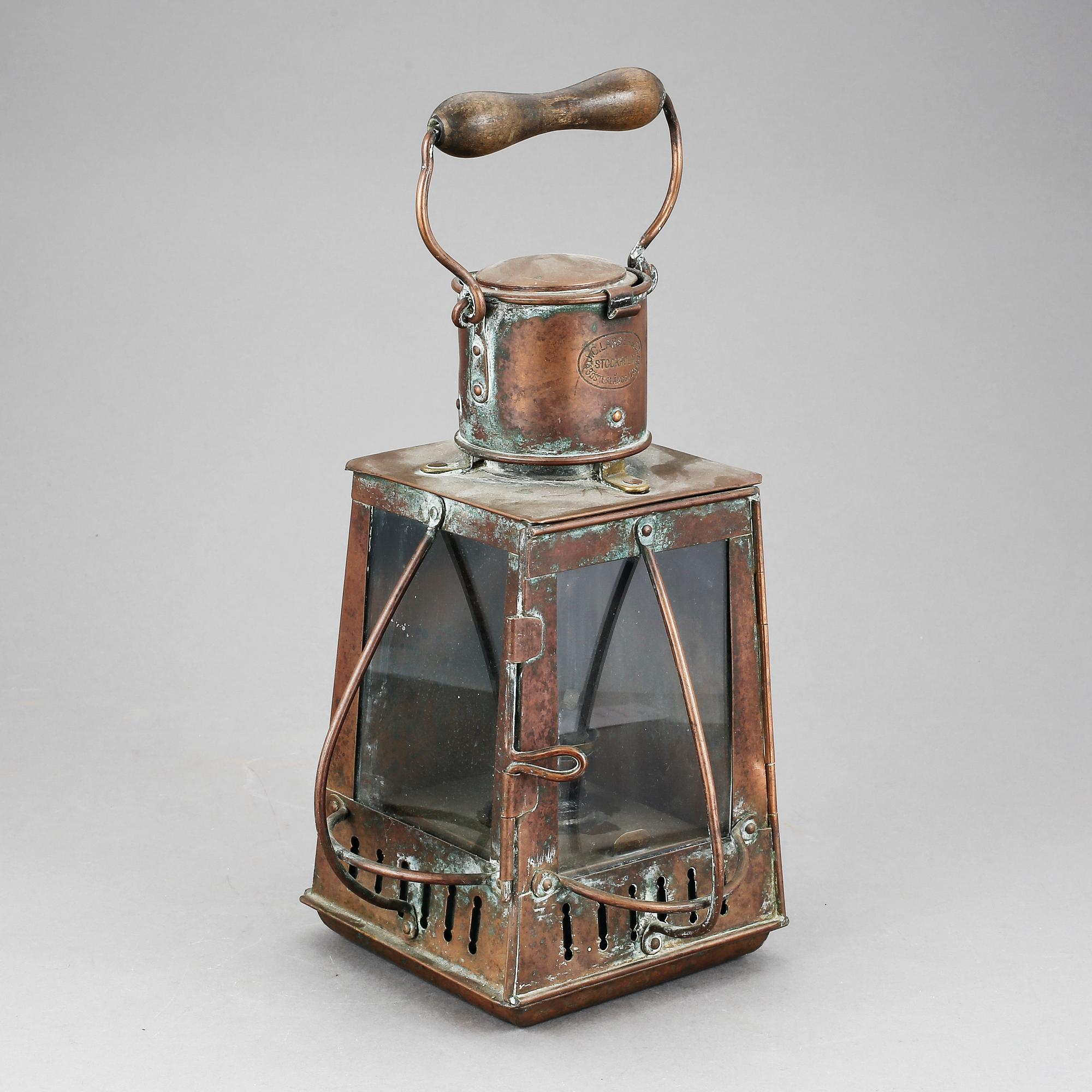 LANTERNA, koppar, J.C Larsén & Co, Österlånggatan 43,  1900-talets första hälft.