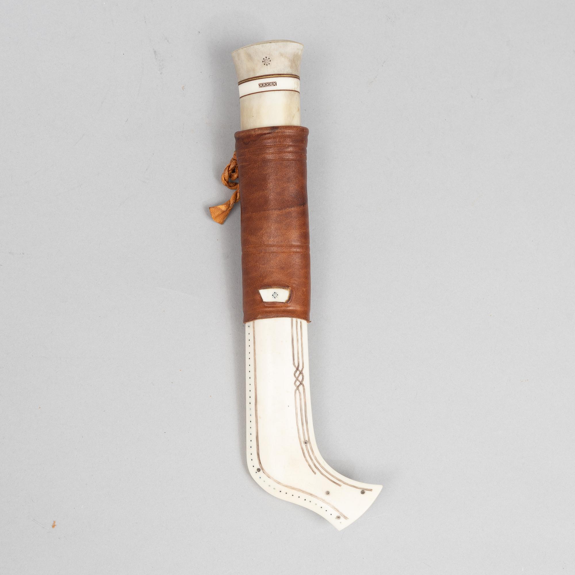 Ingvar Backlund, a reindeer horn knife, signed and dated 99-XX.