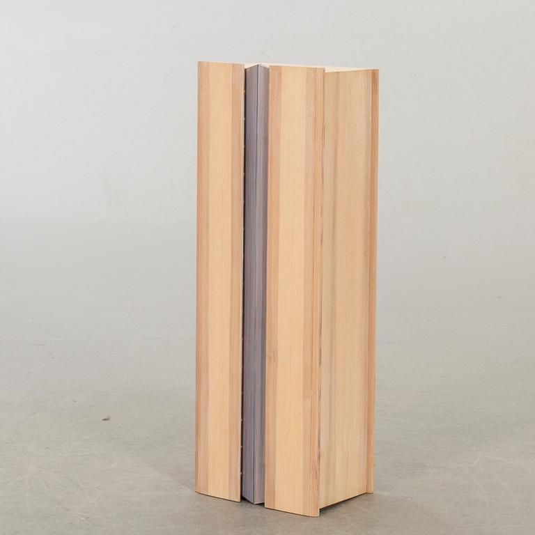 A wall cabinet "Blå ljus" design Olof Pira.