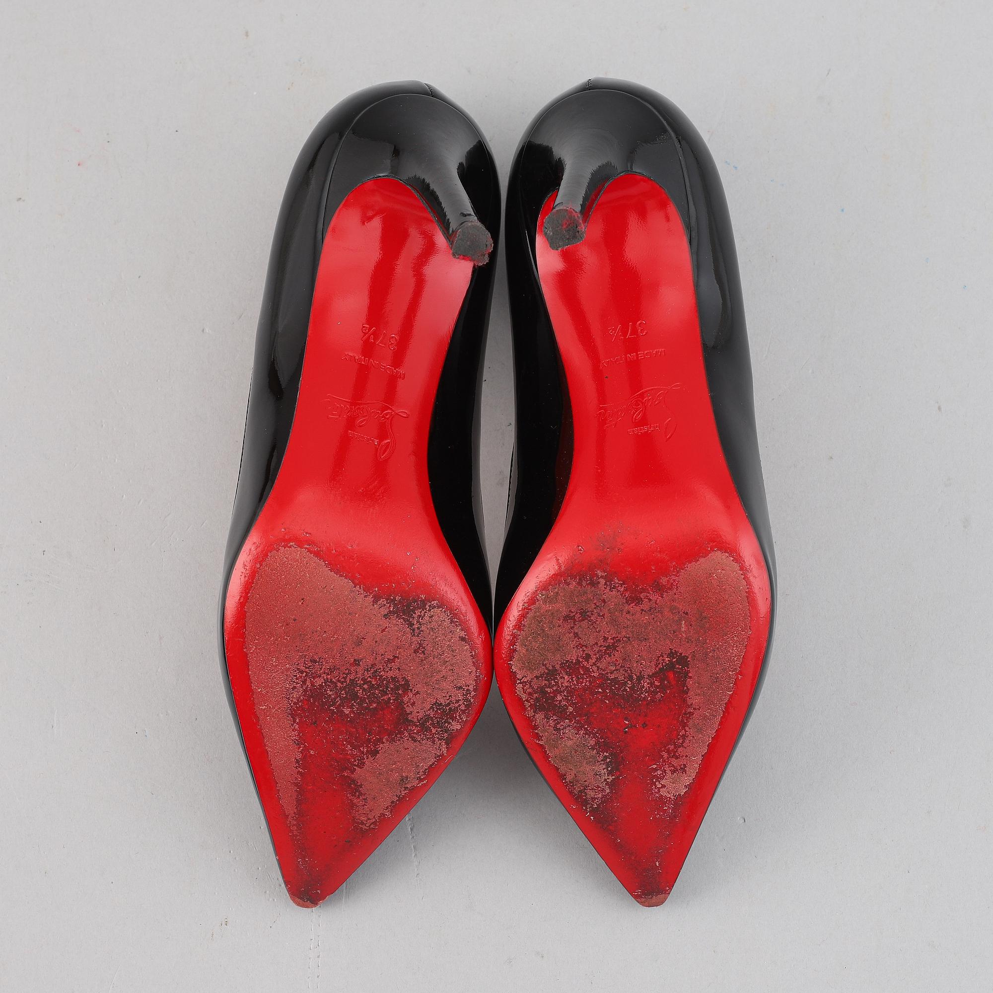 Christian Louboutin, a pair of patent leather high heel shoes, size 37 ½.