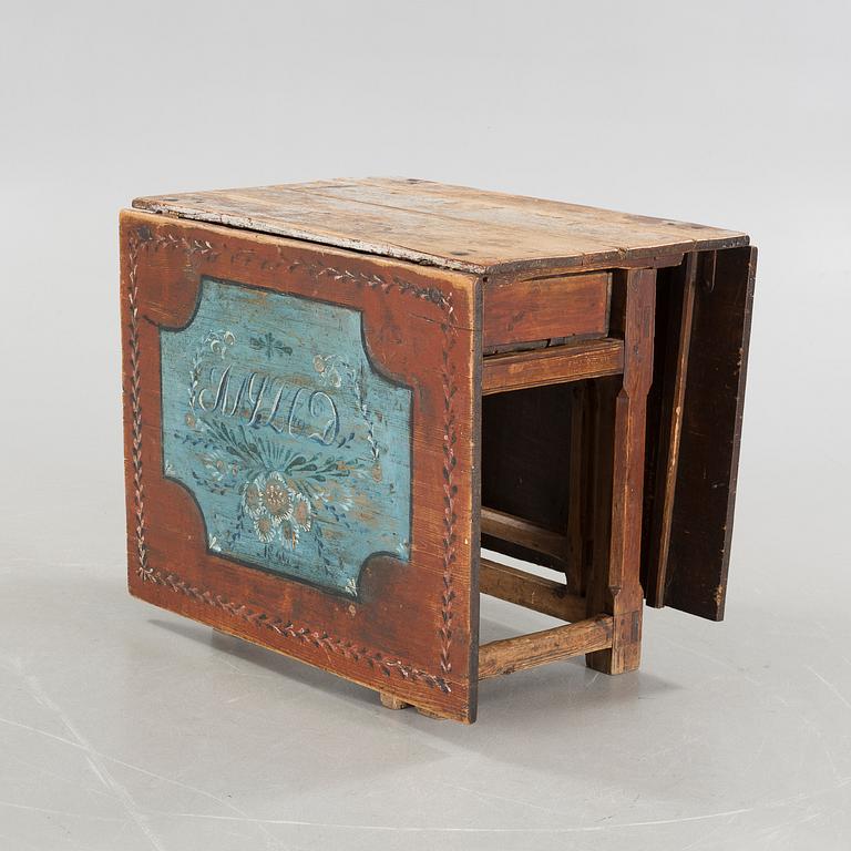 A mid 19th century gateleg table.