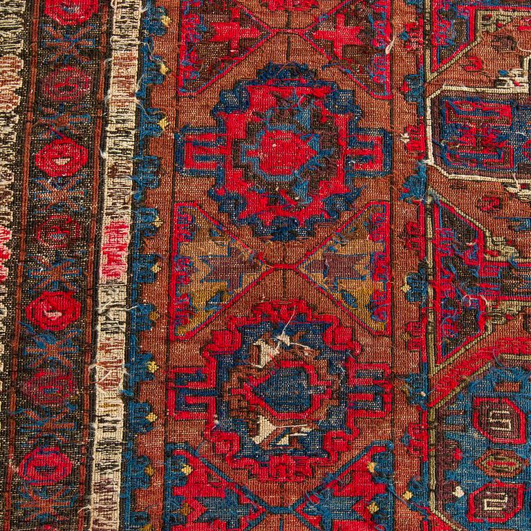 An Antique East Caucasian Soumak carpet ca. 348 x 211 cm.