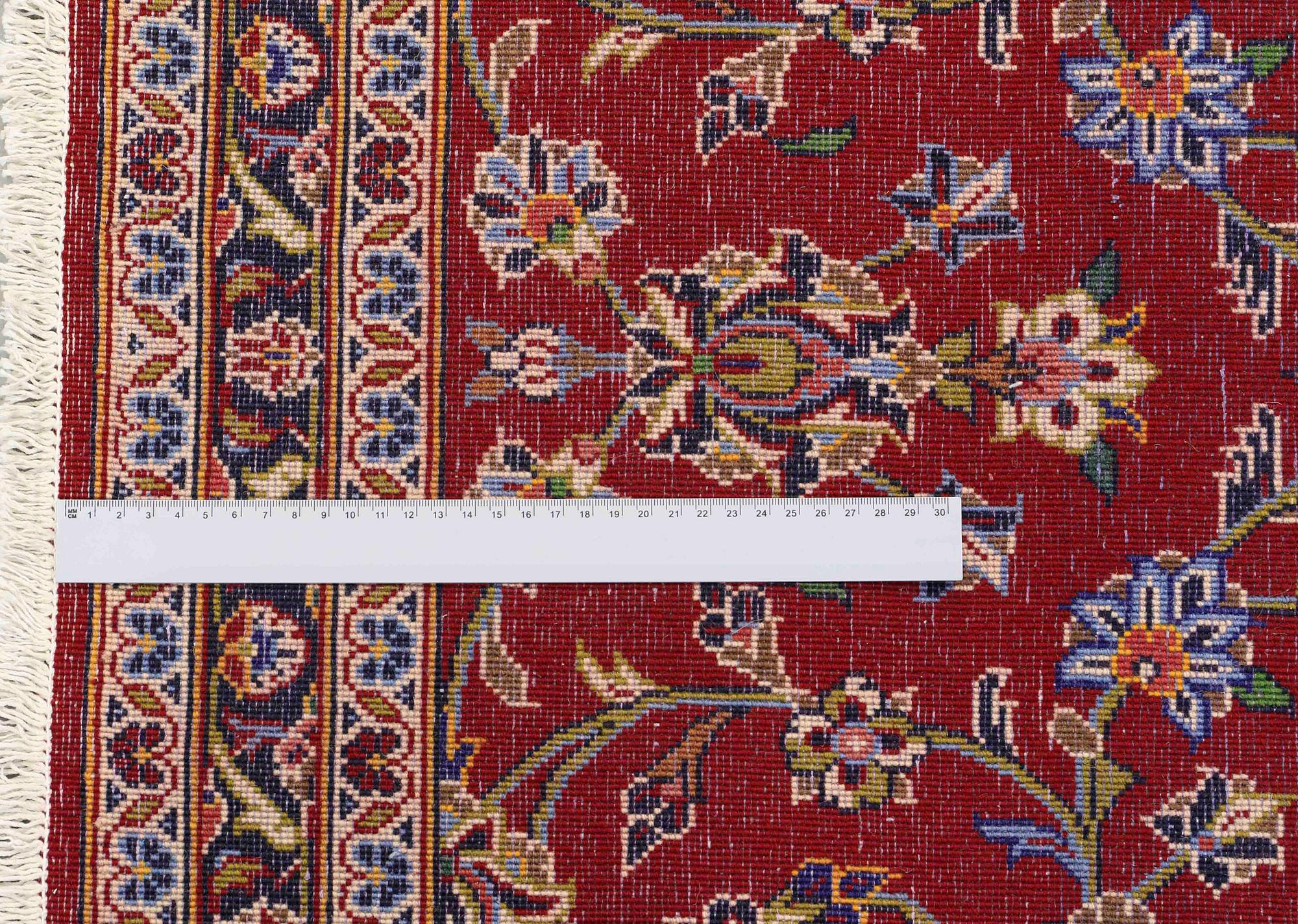 A runner from Kashan, around 500 x 93 cm.