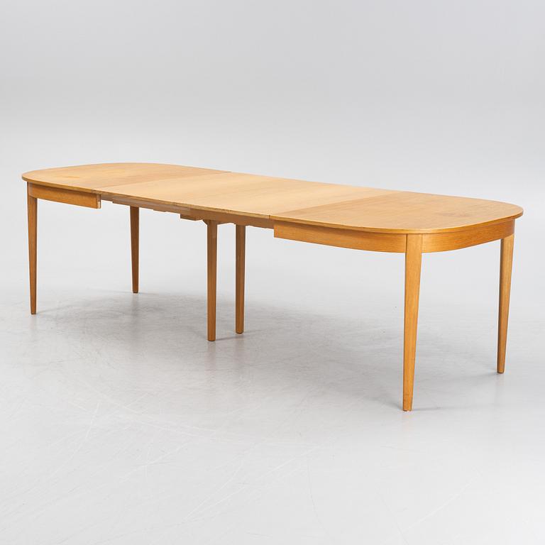 Carl Malmsten, a dining table and four chairs, 'Calmare nyckel', Åfors Möbelfabrik, second half of the 20th century.