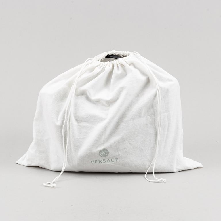 Versace, a black quilted leather handbag.