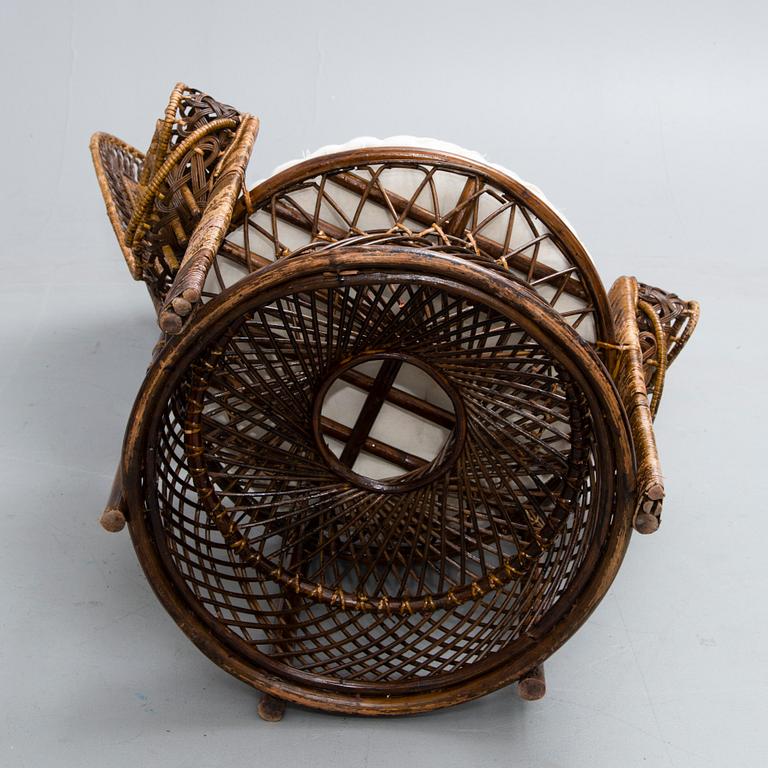 A 1970s rattan 'Peacock chair'.