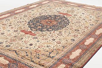 A carpet, semi-antique, Benlian Tabriz, signed Jabarzade, ca 466 x 328,5 cm.