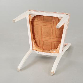 Two gustavian style armchairs and three chairs, first half of the 20th century.