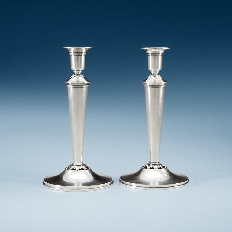 A pair of Atelier Borgila sterling candlestick,