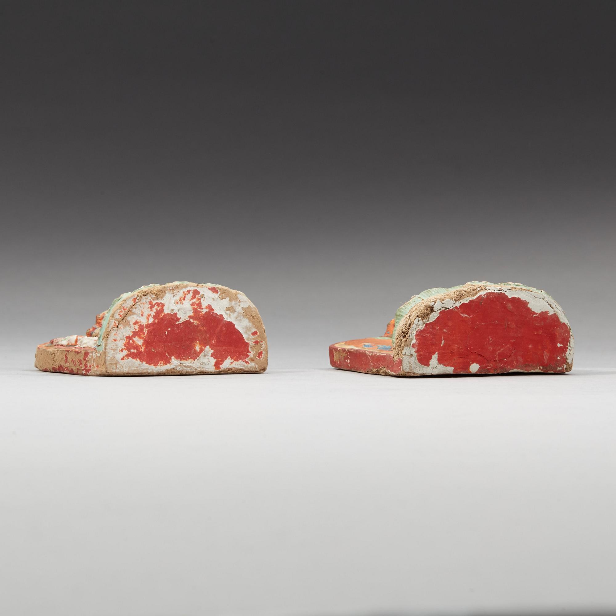 Two clay tsa-tsas, Tibet, 18/19th Century.